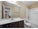Neutral bathroom featuring a vanity, mirror, shower-tub combo, and toilet at 989 Ambergate Sta, Apex, NC 27502