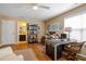Comfortable home office with wood flooring, desk, and bookshelf with an ensuite bathroom at 989 Ambergate Sta, Apex, NC 27502