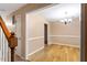 Dining room showcasing hardwood floors, chair rail molding, and chandelier lighting at 1003 Buckhorn Rd, Garner, NC 27529