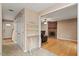 Inviting living room features a brick fireplace, hardwood floors, and neutral paint tones at 1003 Buckhorn Rd, Garner, NC 27529