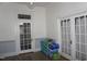 Inviting living room with new hardwood floors, french doors and fresh, neutral paint perfect for relaxing or entertaining at 10095 N Walnut St St, Middlesex, NC 27557