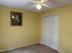 Bedroom featuring a ceiling fan, framed picture and double closet at 103 Kiowa Cv, Louisburg, NC 27549