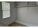 Bright closet space with window, closet rod and shelving perfect for storage at 103 Kiowa Cv, Louisburg, NC 27549