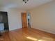 Hardwood floor in a bedroom offering an ensuite bathroom providing convenience and privacy at 1033 Silas Moore Rd, Benson, NC 27504
