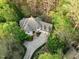 Aerial shot of grand estate surrounded by lush trees at 10370 Spaight, Chapel Hill, NC 27517