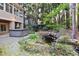 Private backyard oasis features a hot tub and mature landscaping at 10370 Spaight, Chapel Hill, NC 27517