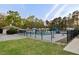 Community pool with ample seating and lounging areas for residents to enjoy on warm days at 10370 Spaight, Chapel Hill, NC 27517