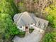 Elegant home with manicured front lawn and circular driveway at 10370 Spaight, Chapel Hill, NC 27517