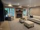 Cozy living area includes fireplace, multiple windows, and comfortable seating at 10370 Spaight, Chapel Hill, NC 27517