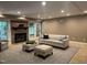 Comfortable living room with fireplace, multiple windows, and stylish seating at 10370 Spaight, Chapel Hill, NC 27517
