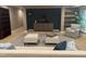 Well-appointed living room featuring dark accent wall, built-ins, and comfortable seating at 10370 Spaight, Chapel Hill, NC 27517