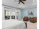 Bright main bedroom with french doors leading to a screened porch at 10370 Spaight, Chapel Hill, NC 27517