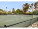 Enjoy a match on the well-maintained community tennis courts, complete with lighting for evening play at 10370 Spaight, Chapel Hill, NC 27517