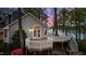 Beautiful deck with lake views, ideal for outdoor relaxation and entertaining at 104 Stage Line Cv, Louisburg, NC 27549