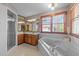 Bathroom features soaking tub, glass enclosed shower and double sink vanity at 104 Stage Line Cv, Louisburg, NC 27549