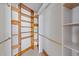 Walk-in closet with adjustable shelving and ample storage space, perfect for organization at 104 Stage Line Cv, Louisburg, NC 27549