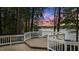 Lakeside deck with beautiful railings providing gorgeous sunset views at 104 Stage Line Cv, Louisburg, NC 27549