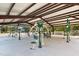 Open-air exercise area featuring a variety of outdoor fitness equipment for a convenient workout at 104 Stage Line Cv, Louisburg, NC 27549