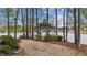Gazebo overlooking the lake in a serene setting at 104 Stage Line Cv, Louisburg, NC 27549
