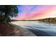 Lakeside living with gradual beach access that captures the calm serenity of lake life at 104 Stage Line Cv, Louisburg, NC 27549