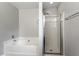Bathroom featuring a tub and shower at 109 Wyeth Meadows Ln, Holly Springs, NC 27540