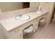 Bathroom featuring dual sinks with a white countertop and stylish seating at 1104 W Cole St, Dunn, NC 28334