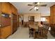 Another view of the kitchen with vintage appliances and a view into the living room at 1104 W Cole St, Dunn, NC 28334