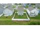 Aerial view of the home and backyard, with a fenced in lawn in a planned community at 111 Flying Point Ln, Clayton, NC 27520
