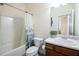 Bathroom featuring vanity, combined tub and shower, and toilet at 111 Flying Point Ln, Clayton, NC 27520