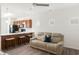 Open floorplan living area with a comfortable couch and natural light from the windows at 111 Flying Point Ln, Clayton, NC 27520