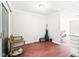 Bright room features wood floors and view into the kitchen with bar height countertop at 116 Marlowe Court Ct, Carrboro, NC 27510
