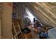 Unfinished attic space showing insulation and storage potential at 125 Dartmoor Ln, Raleigh, NC 27614
