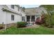 Scenic backyard with lush lawn, patio, and fire pit, providing a perfect outdoor space for entertaining and relaxation at 125 Dartmoor Ln, Raleigh, NC 27614