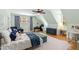 Inviting bedroom features hardwood floors, ceiling fan and a large window at 125 Dartmoor Ln, Raleigh, NC 27614