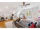 Charming bedroom featuring hardwood floors, ceiling fan and twin beds at 125 Dartmoor Ln, Raleigh, NC 27614