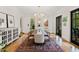 Elegant dining room features hardwood floors, stylish chandelier, and natural light at 125 Dartmoor Ln, Raleigh, NC 27614