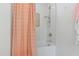 Bright shower featuring white subway tile and chrome fixtures at 125 Dartmoor Ln, Raleigh, NC 27614