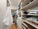 Spacious walk-in closet with custom shelving and storage solutions for optimal organization at 125 Dartmoor Ln, Raleigh, NC 27614
