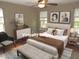 Tranquil bedroom with soft natural light, refined decor, and a calming color palette at 126 Creedmoor Rd, Stem, NC 27581