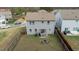 Aerial of backyard featuring a patio with pergola, grill, outdoor seating, and a wood privacy fence at 1620 Frog Hollow Way, Wake Forest, NC 27587