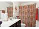 Bathroom featuring a vanity and colorful shower curtain at 1620 Frog Hollow Way, Wake Forest, NC 27587