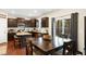 Inviting dining area connected to the kitchen, featuring a table and sliding door access to the backyard at 1620 Frog Hollow Way, Wake Forest, NC 27587