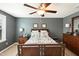 Comfortable primary bedroom with ceiling fan, carpet and neutral paint at 1620 Frog Hollow Way, Wake Forest, NC 27587