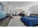 Expansive bonus room offering bedroom area, workout area and comfortable seating at 175 Brazil Nut Ln, Smithfield, NC 27577