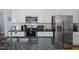 Well-equipped kitchen featuring stainless steel appliances, granite countertops, and white cabinets, offering style and functionality at 175 Brazil Nut Ln, Smithfield, NC 27577