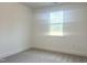 Bright bedroom with neutral carpet and natural light at 176 Golfview Ave, Benson, NC 27504
