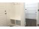 Bright mudroom features a built-in bench with storage and access to a pantry at 176 Golfview Ave, Benson, NC 27504