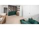 Bedroom featuring accent wall, modern furniture, and a bright carpet at 196 River Bank Rd, Fuquay Varina, NC 27526