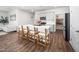 Open kitchen with a large island, seating for four, and a walk-in pantry at 196 River Bank Rd, Fuquay Varina, NC 27526