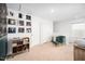 Cozy loft space with decorative record albums, a vanity, and comfortable seating near a bright window at 196 River Bank Rd, Fuquay Varina, NC 27526